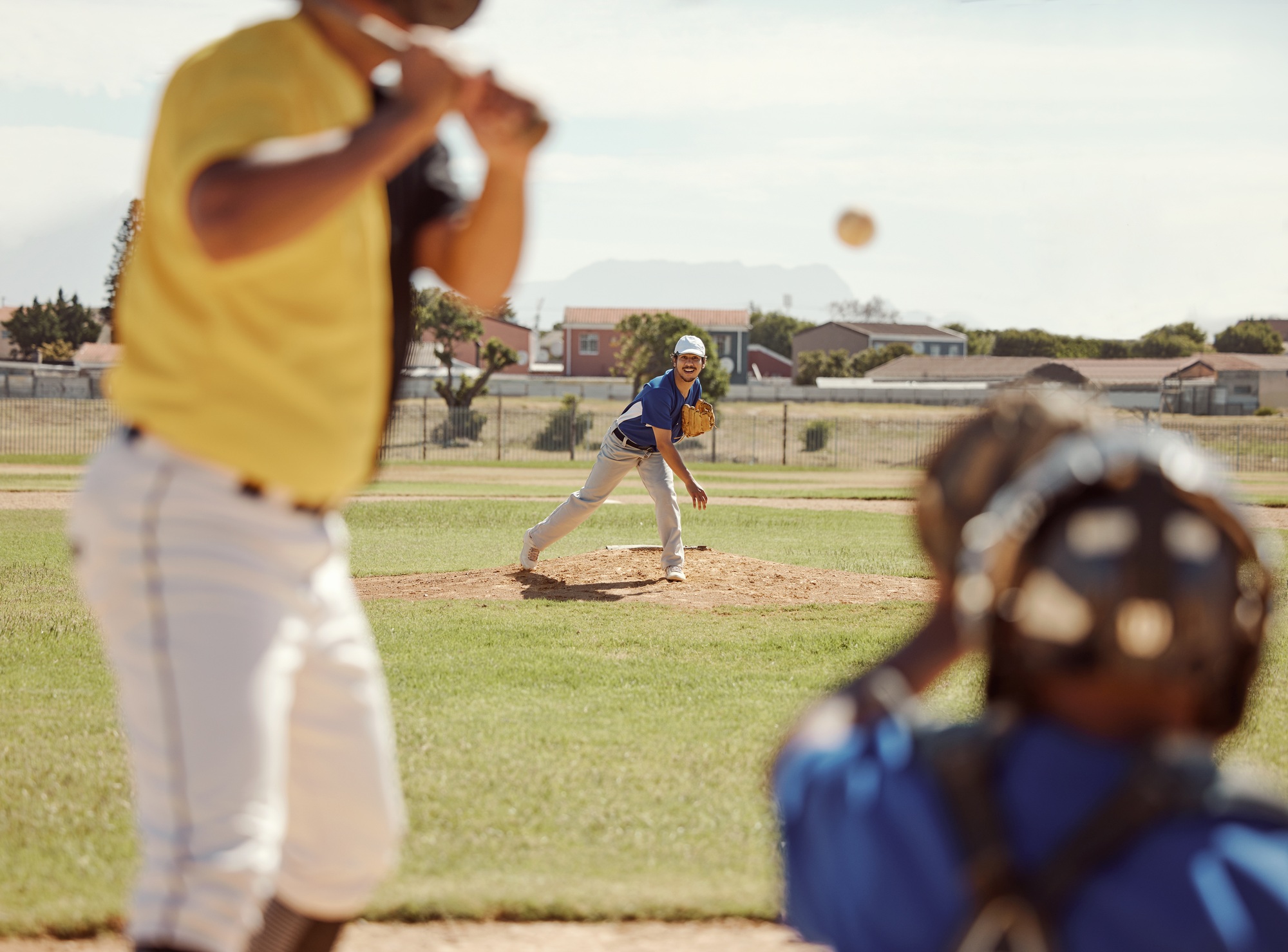 Baseball, bat and man ready for a fast ball on a baseball field in a training match or game outdoor