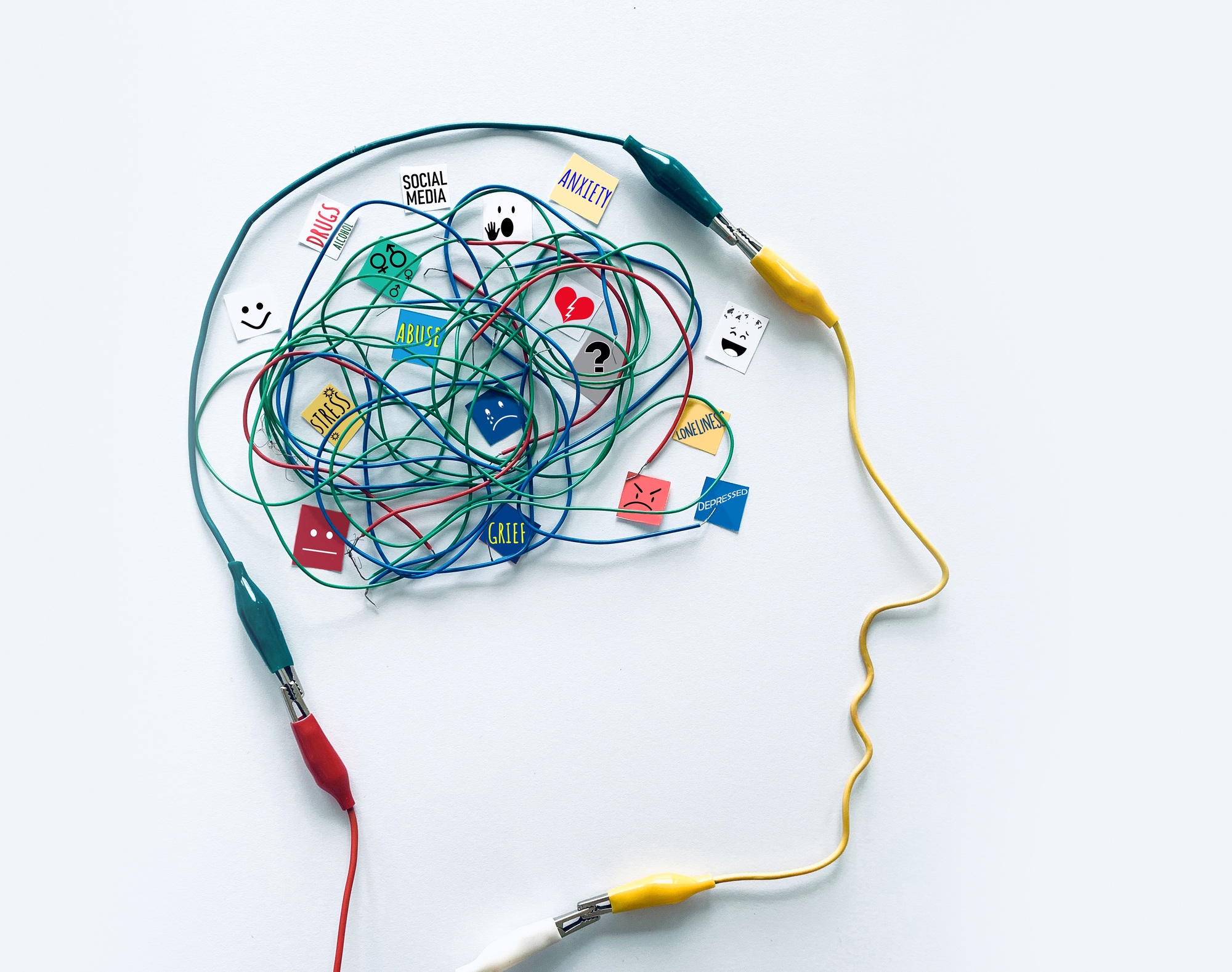 Mental Health concept with many of the factors that can affect the brain triggering mental illness